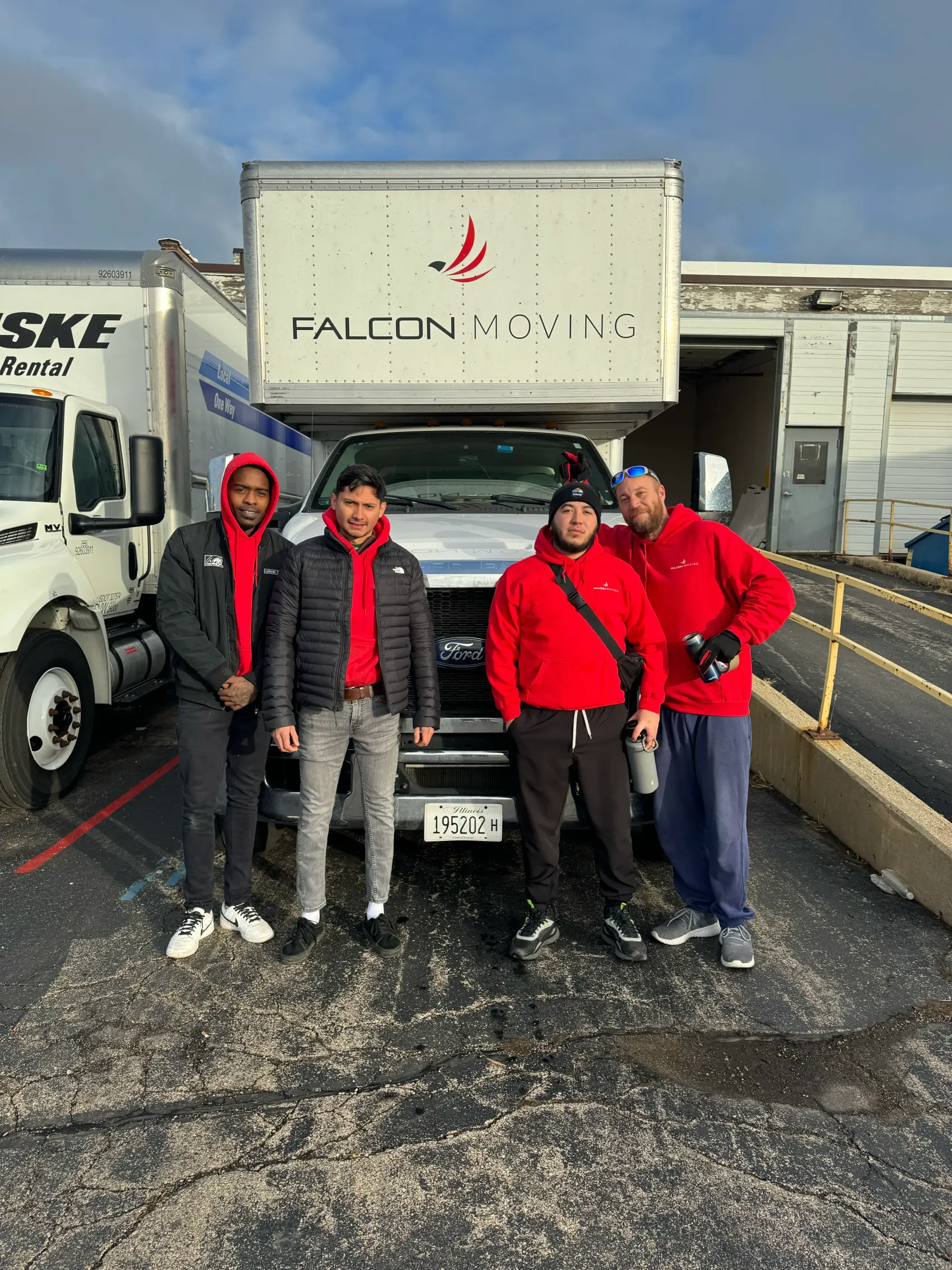 Falcon Moving crew positioned at a loading ramp for labor help
