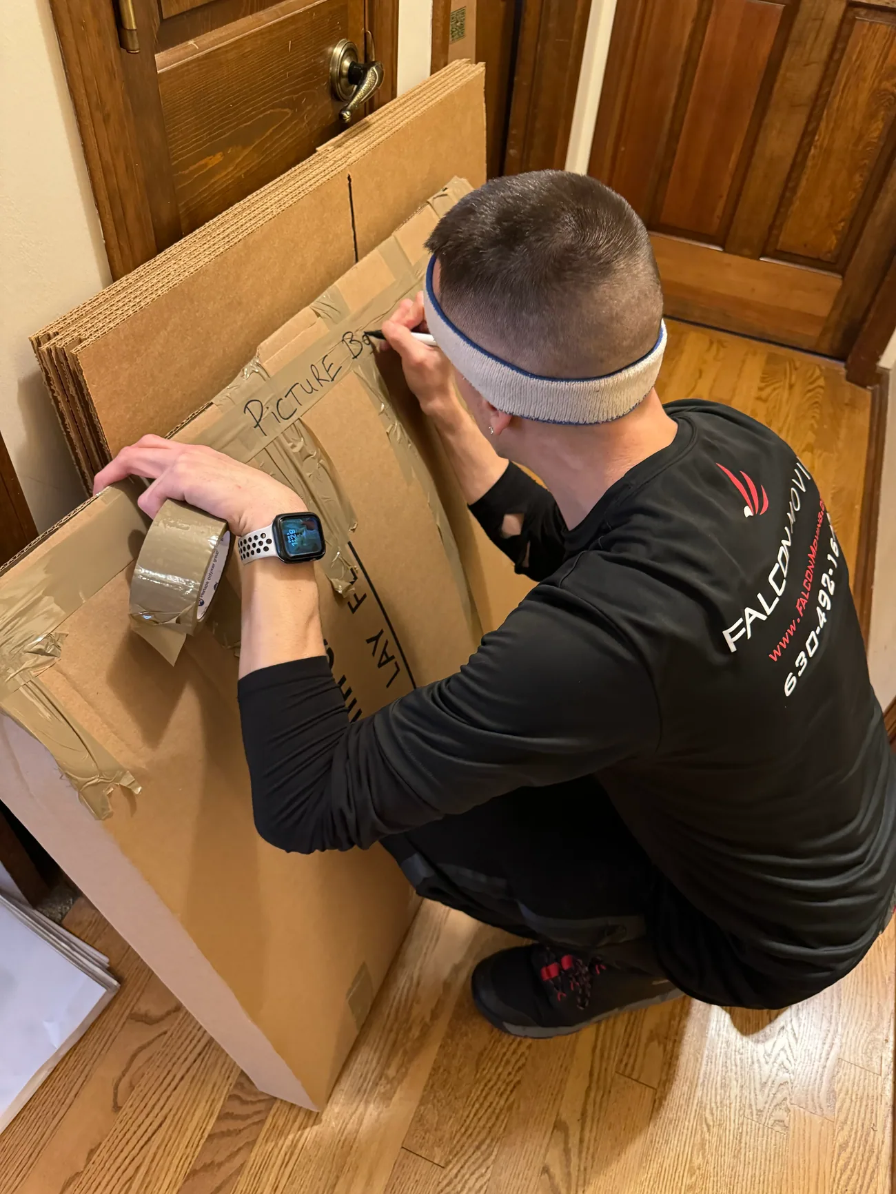 Falcon crew laying stair protection at a St. Charles home
