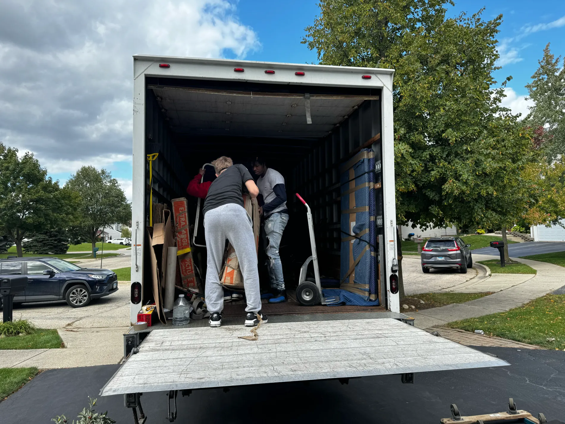 Falcon Moving crew loading a truck for a larger route
